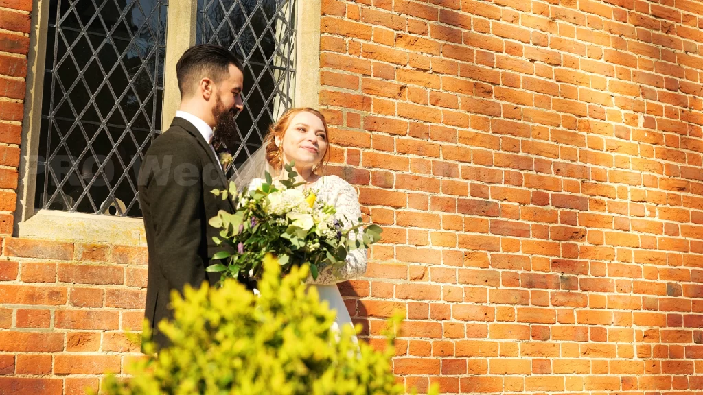 groom bride smile wall